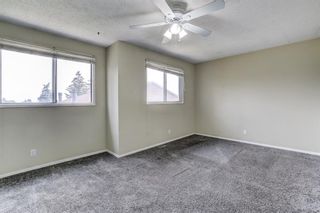Photo 12: 12 4940 39 Avenue SW in Calgary: Glenbrook Row/Townhouse for sale : MLS®# A2001522
