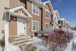 Photo 2: 321 Toscana Gardens NW in Calgary: Tuscany Row/Townhouse for sale : MLS®# A2029043