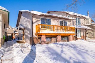 Main Photo: 2432 Woodview Drive SW in Calgary: Woodlands Semi Detached (Half Duplex) for sale : MLS®# A2108326