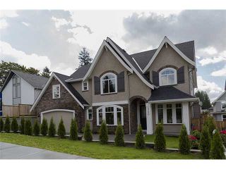Photo 1: 720 COMO LAKE Avenue in Coquitlam: Coquitlam West House for sale : MLS®# V1072916