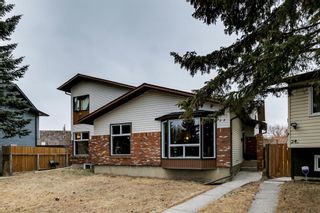 Photo 1: 20 & 22 Cedarwood Rise SW in Calgary: Cedarbrae Duplex for sale : MLS®# A1221120