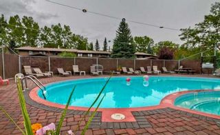 Photo 2: 17 10910 Bonaventure Drive SE in Calgary: Willow Park Row/Townhouse for sale : MLS®# A2088826