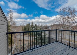 Photo 7: 4 Eversyde Park SW in Calgary: Evergreen Row/Townhouse for sale : MLS®# A1098809