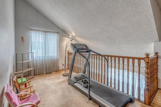 Photo 16: 148 Coachwood Crescent SW in Calgary: Coach Hill Detached for sale : MLS®# A2037360