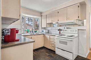 Photo 13: 5831 21 Street SW in Calgary: North Glenmore Park Detached for sale : MLS®# A2033276