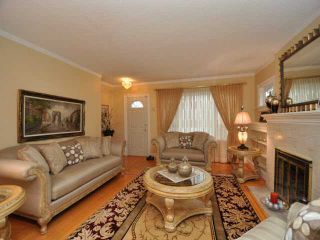 Photo 3: 2992 E 2ND Avenue in Vancouver: Renfrew VE House for sale (Vancouver East)  : MLS®# V874739
