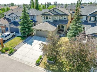 Photo 1: 153 Everwillow Green SW in Calgary: Evergreen Detached for sale : MLS®# A2077648