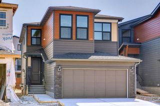 Photo 2: 20 Rowley Common NW in Calgary: C-483 Detached for sale : MLS®# A2000314