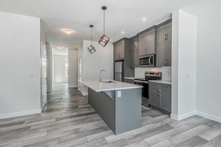 Photo 11: 140 Amblehurst Green NW in Calgary: C-527 Detached for sale : MLS®# A2057379