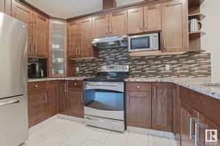 Photo 9: 13028 166 Avenue NW in Edmonton: Zone 27 House Half Duplex for sale : MLS®# E4382569
