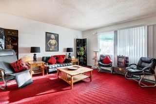Photo 5: 912 69 Avenue SW in Calgary: Kingsland Full Duplex for sale : MLS®# A2021286