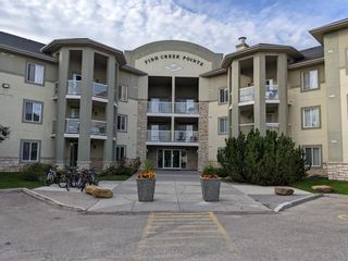 Photo 1: 1214 2518 Fish Creek Boulevard SW in Calgary: Evergreen Apartment for sale : MLS®# A1253857