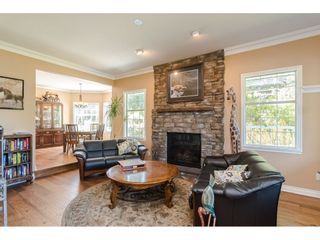 Photo 15: 25120 57 Avenue in Langley: Salmon River House for sale in "Strawberry Hills" : MLS®# R2500830