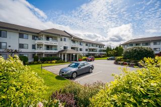 Photo 1: 216 2451 GLADWIN Road in Abbotsford: Abbotsford West Condo for sale in "Centennial Court - Maples" : MLS®# R2688829