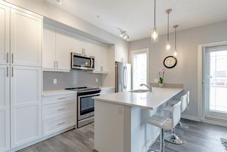 Photo 8: 211 100 Auburn Meadows Manor SE in Calgary: Auburn Bay Apartment for sale : MLS®# A1220075