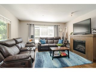 Photo 3: A107 8929 202 Street in Langley: Willoughby Heights Condo for sale in "The GROVE" : MLS®# R2468942