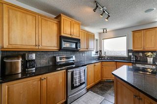 Photo 3: 7771 Springbank Way SW in Calgary: Springbank Hill Detached for sale : MLS®# A2058722