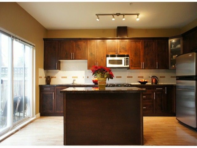 Photo 1: Photos: 140 20449 66TH Avenue in Langley: Willoughby Heights Townhouse for sale in "NATURES LANDING" : MLS®# F1300820