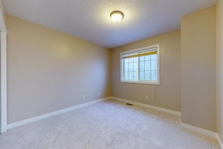 Photo 24: 193 Rockysprings Grove NW in Calgary: Rocky Ridge Row/Townhouse for sale : MLS®# A1162472