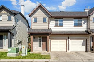 Photo 1: 136 Everridge Gardens SW in Calgary: Evergreen Row/Townhouse for sale : MLS®# A1259244