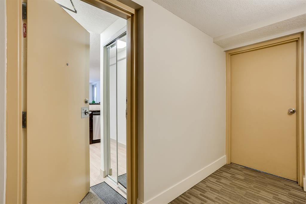 Photo 3: Photos: 106 728 3 Avenue NW in Calgary: Sunnyside Apartment for sale : MLS®# A1061819