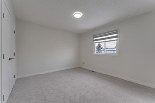 Photo 8: 221 Penworth Drive SE in Calgary: Penbrooke Meadows Row/Townhouse for sale : MLS®# A1183714