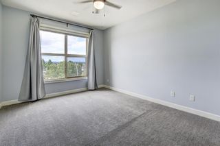 Photo 11: 405 88 Arbour Lake Road NW in Calgary: Arbour Lake Apartment for sale : MLS®# A2048525