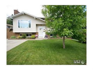 Photo 1: 473 BROOKMERE Crescent SW in Calgary: Braeside Residential for sale ()  : MLS®# C3573180