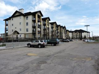 Photo 2: 8302 304 MACKENZIE Way SW: Airdrie Apartment for sale : MLS®# C4222682