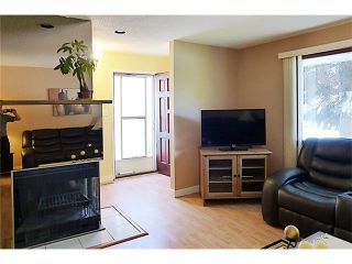 Photo 11: 11209 11 Street SW in Calgary: Southwood House for sale : MLS®# C4062440