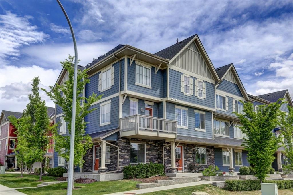 Main Photo: 1002 125 PANATELLA Way NW in Calgary: Panorama Hills Row/Townhouse for sale : MLS®# A1120145