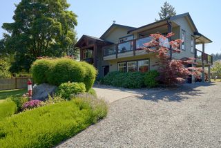 Photo 1: 6620 W Island Hwy in Bowser: PQ Bowser/Deep Bay House for sale (Parksville/Qualicum)  : MLS®# 910892