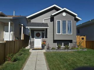 Photo 1: 60 Erin Meadow Way SE in Calgary: Erin Woods Detached for sale : MLS®# A2093800