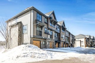 Photo 1: 107 Ascot Point SW in Calgary: Aspen Woods Row/Townhouse for sale : MLS®# A2033826