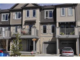 Photo 1: 64 WINDSTONE Green SW: Airdrie Townhouse for sale : MLS®# C3566494