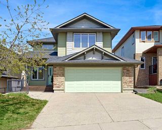 Photo 1: 12 Crestmont Way SW in Calgary: Crestmont Detached for sale : MLS®# A2130928