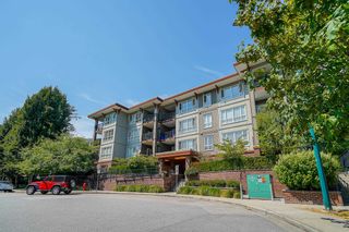 Photo 3: 201 2473 ATKINS Avenue in Port Coquitlam: Central Pt Coquitlam Condo for sale in "Valore On The Park" : MLS®# R2703431