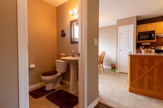 Photo 9: 113 Everhollow Heights SW in Calgary: Evergreen Row/Townhouse for sale : MLS®# A1215012