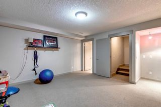 Photo 31: 119 Couture Crescent SW in Calgary: Garrison Green Row/Townhouse for sale : MLS®# A1197042