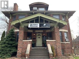 Photo 1: 131 ELLIOTT STREET West in Windsor: House for sale : MLS®# 23023312