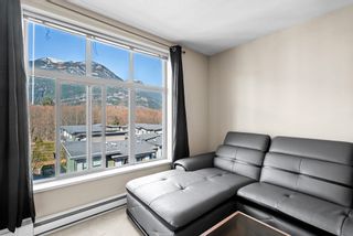 Photo 3: 409 1211 VILLAGE GREEN Way in Squamish: Downtown SQ Condo for sale in "Rockcliff at Eaglewind" : MLS®# R2864593