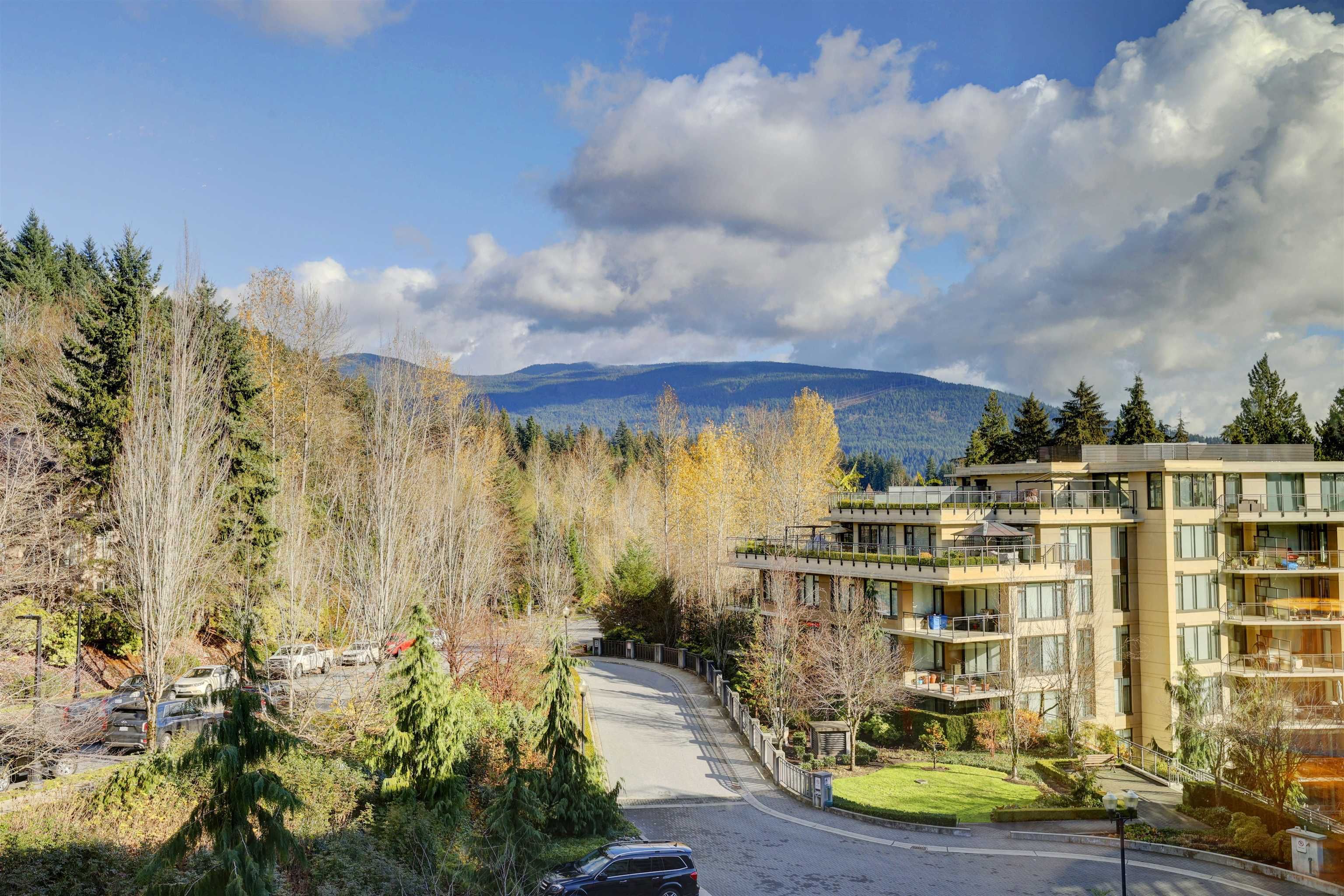 Main Photo: 806 2950 PANORAMA Drive in Coquitlam: Westwood Plateau Condo for sale in "The Cascades" : MLS®# R2633935