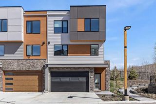 Photo 1: 54 Na'a Heights SW in Calgary: Medicine Hill Row/Townhouse for sale : MLS®# A2131383