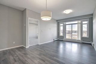 Photo 8: 106 6703 New Brighton Avenue SE Calgary Home For Sale