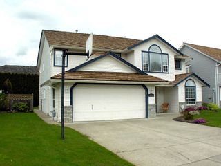 Photo 3: 35453 LETHBRIDGE Drive in Abbotsford: Abbotsford East House for sale in "Sandy Hill" : MLS®# F1110467