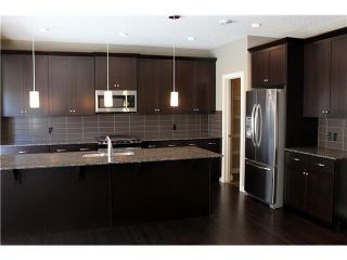 Photo 5: 29 CRANARCH Place SE in : Cranston Residential Detached Single Family for sale (Calgary)  : MLS®# C3625691