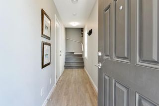 Photo 2: 701 428 Nolan Hill Drive NW in Calgary: Nolan Hill Row/Townhouse for sale : MLS®# A2001607