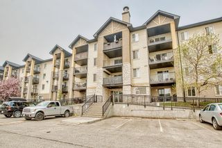 Photo 1: 8102 304 MacKenzie Way SW: Airdrie Apartment for sale : MLS®# A2049550