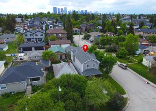 Photo 1: 301 27 Avenue NE in Calgary: Tuxedo Park Detached for sale : MLS®# A1232466