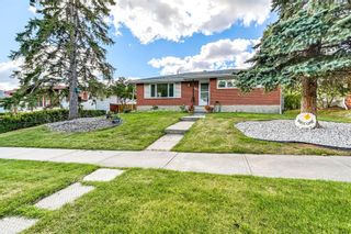Photo 2: 803 72 Avenue NW in Calgary: Huntington Hills Detached for sale : MLS®# A2001818